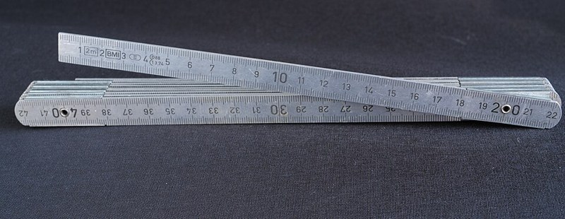 Photograph of aluminium folding ruler.