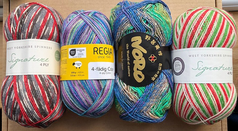 Photograph of multicolour yarn bundle.