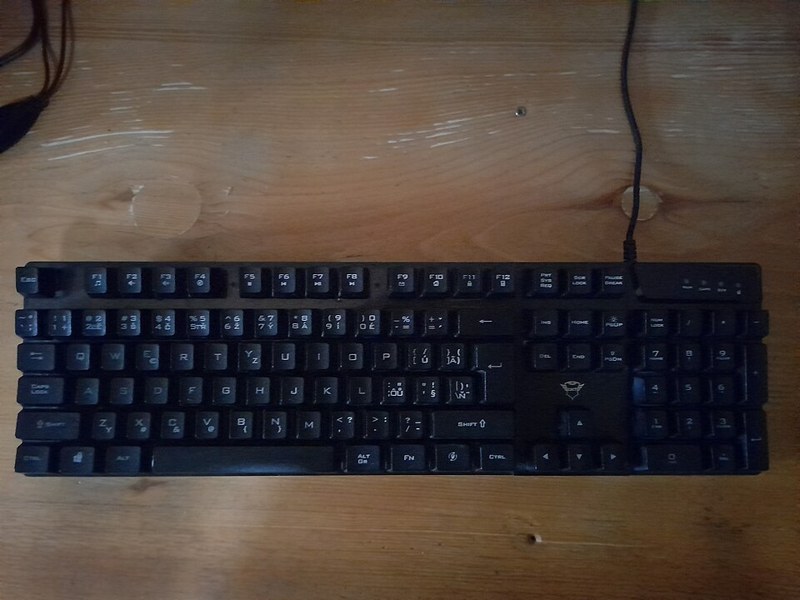 Photograph of black desktop keyboard.