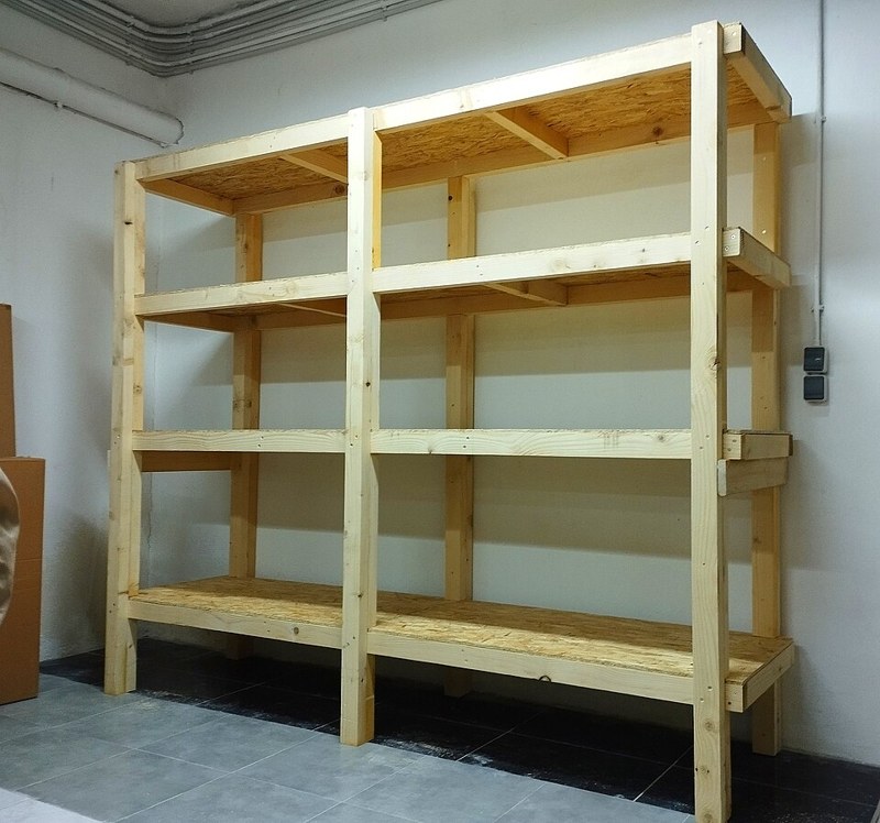 Photograph of wooden studio shelving.