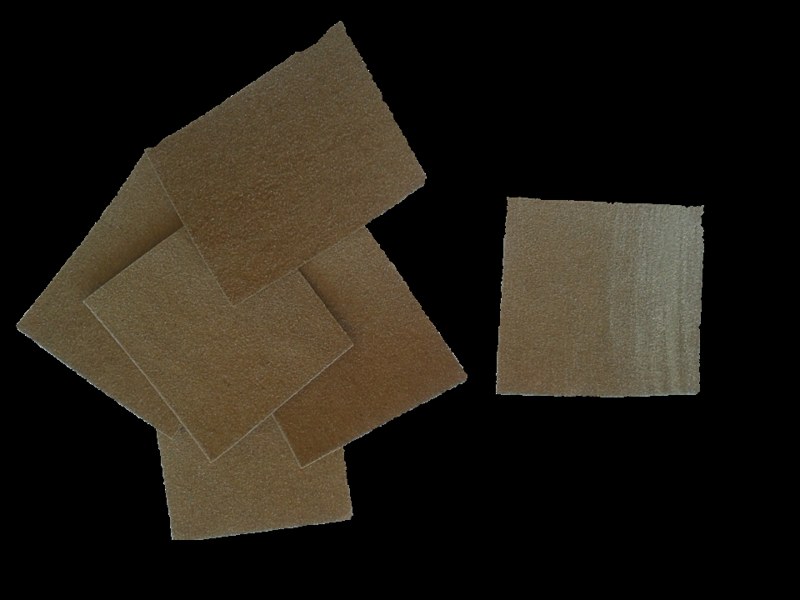Photograph of sandpaper assortment.