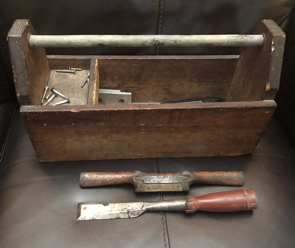 Wooden toolbox with hand tools