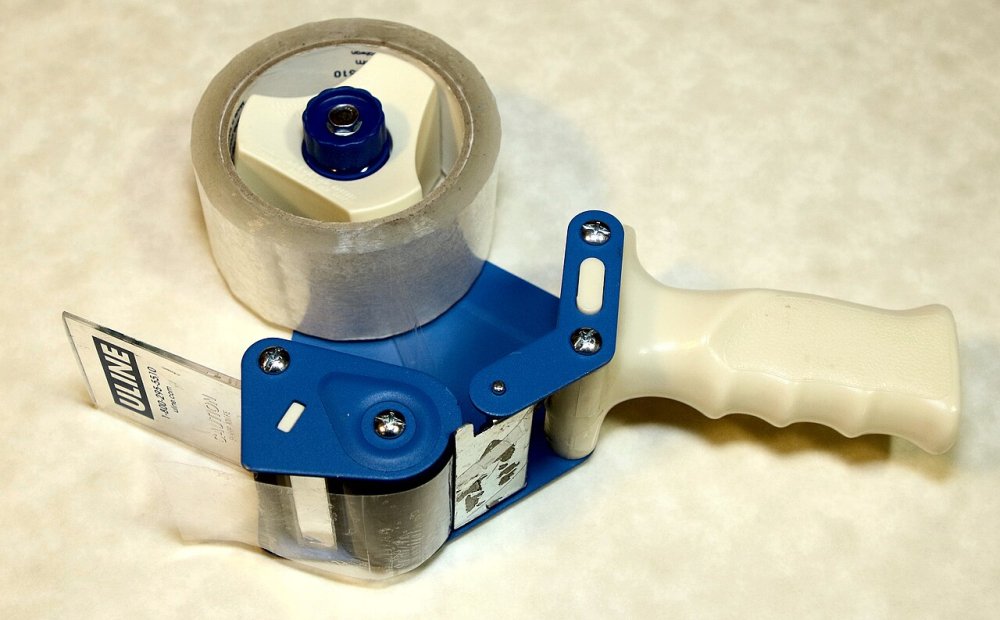 Packing tape dispenser