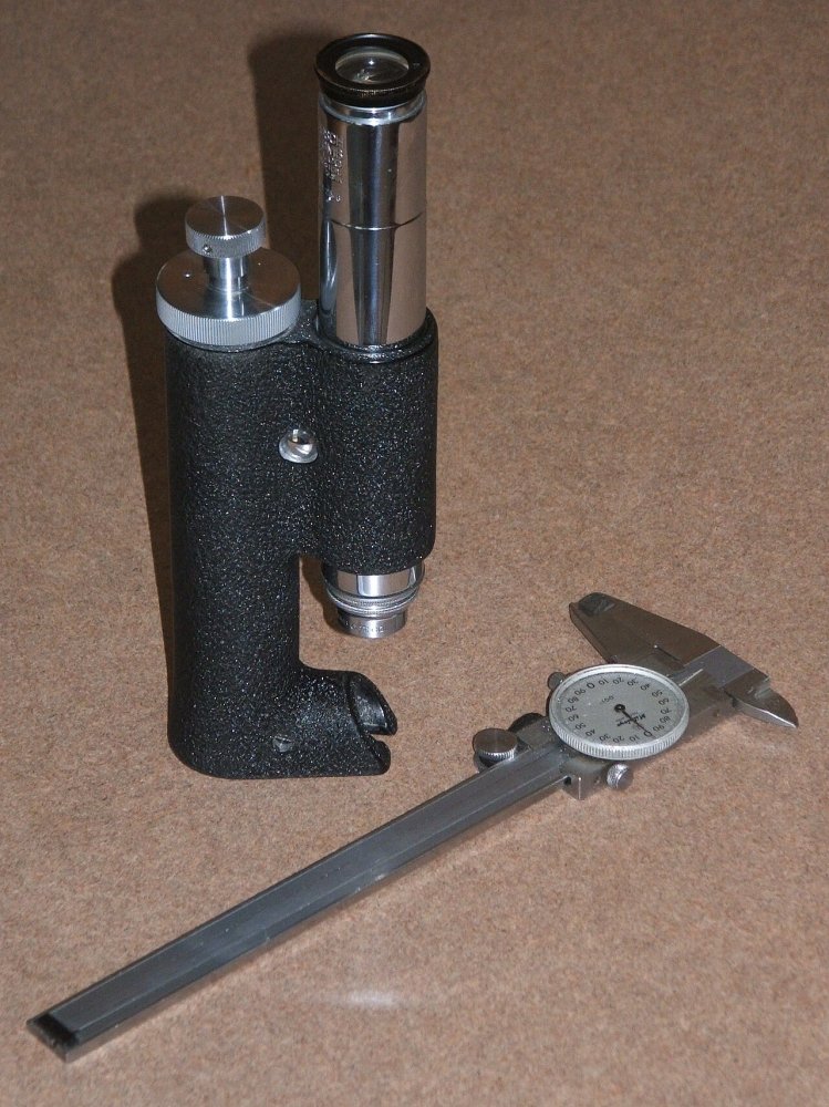 Dial caliper and measuring scope