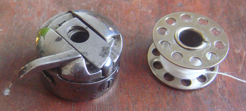 Sewing bobbin and bobbin case