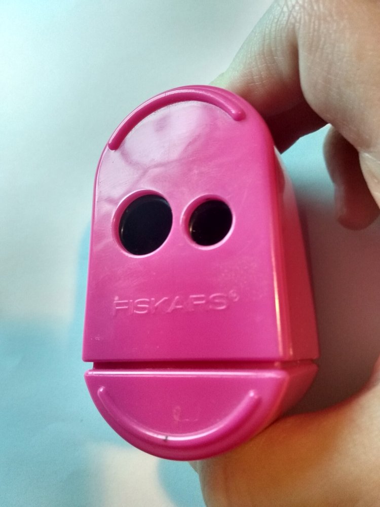 Two-hole pencil sharpener